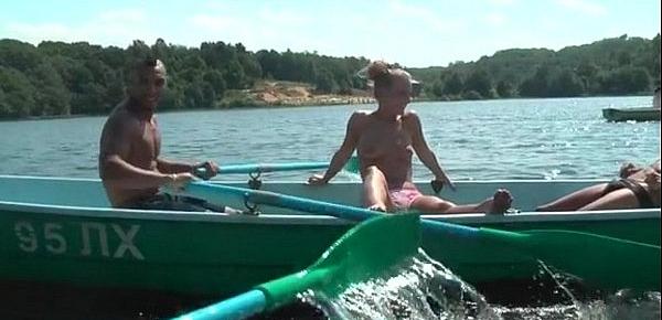  Blonde fucked hard in a boat on the lake three guys